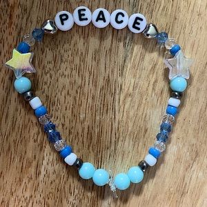 5 for $20 Taylor Swift Handmade Friendship Beaded Bracelet
“Peace”